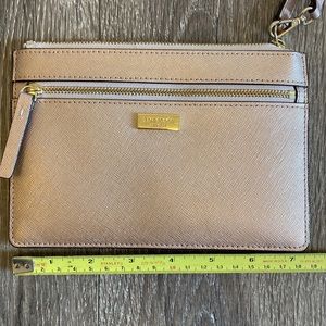 Kate Spade Rose Gold wristlet purse.